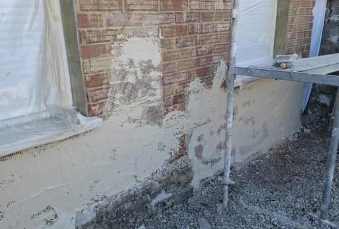 Finition talochée sur façade rénovée